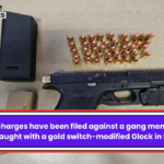 Federal charges have been filed against a gang member who was caught with a gold switch-modified Glock in Dallas